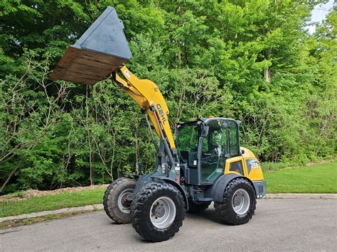 compact excavators wheel loaders|small articulating wheel loaders.